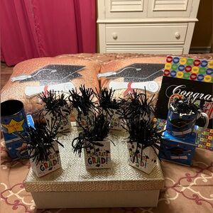 Graduation bundle. 7 cute balloon weights, 2 NWT mugs w/ boxes, 2 wall decor